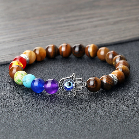 Image de bracelet 7 chakras en pierres naturelles — harmonie, protection et énergie spirituelle avec œil de tigre et main de fatma - bijou méditation et bien-être